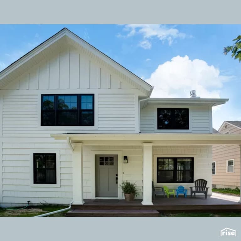 Exterior with Solid Wood Door by Constructive Builders