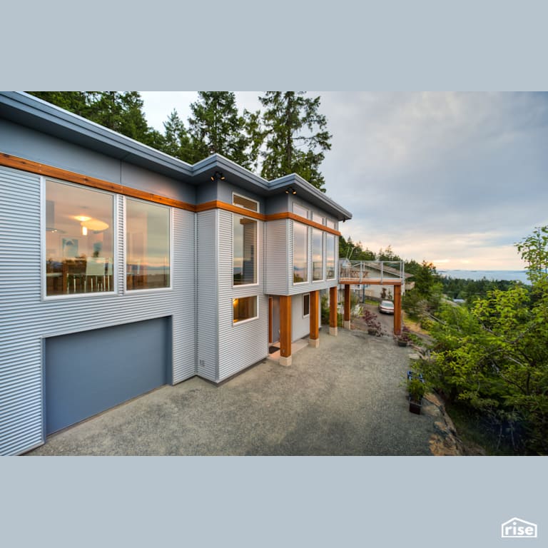 Hillside House - West Coast Modern Build - Exterior with Accent Outdoor Lighting by Pheasant Hill Homes Ltd.