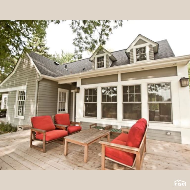 Exterior Deck with Clapboard Wood Siding by Constructive Builders