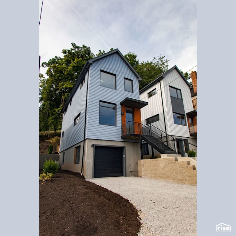 Black Street Development Exterior Left View with Shiplap Wood Siding by Module