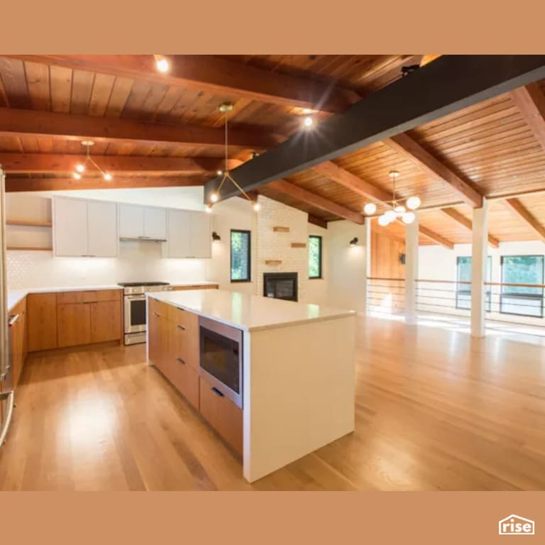 Kitchen with Gas Range by Constructive Builders