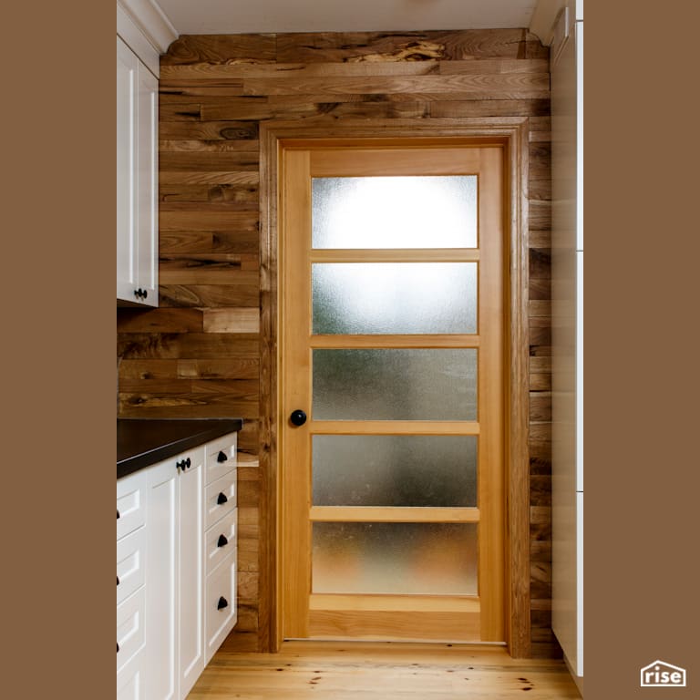 Red Castle Kitchen Door with Reclaimed Hardwood by The Conscious Builder