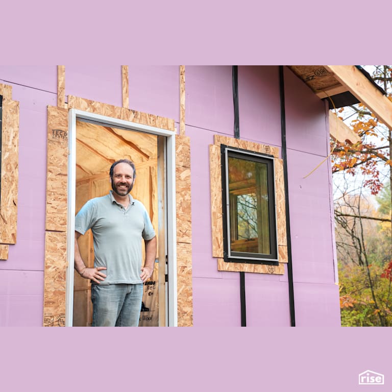 Happy Owner with Sheep's Wool Batt Insulation by Havelock Wool