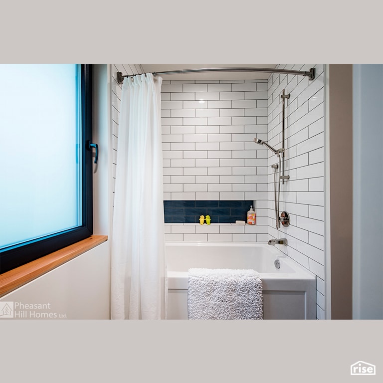 Bathroom with Low-Flow Showerhead by Pheasant Hill Homes Ltd.