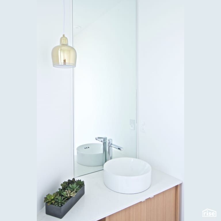 Powder Room with Low-Flow Bathroom Faucet by Naikoon Contracting