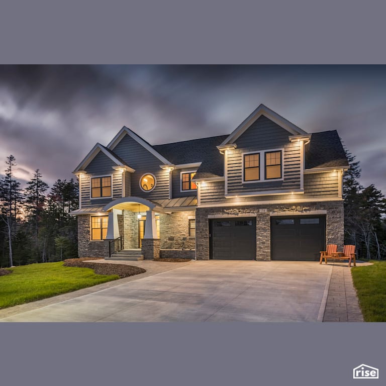 Executive Living - Exterior with Brick Siding by Homes by Highgate