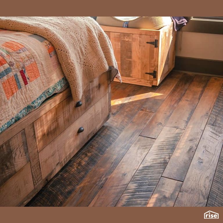 Reclaimed wood flooring in bedroom with Interior Wood Finish by Vermont Natural Coatings