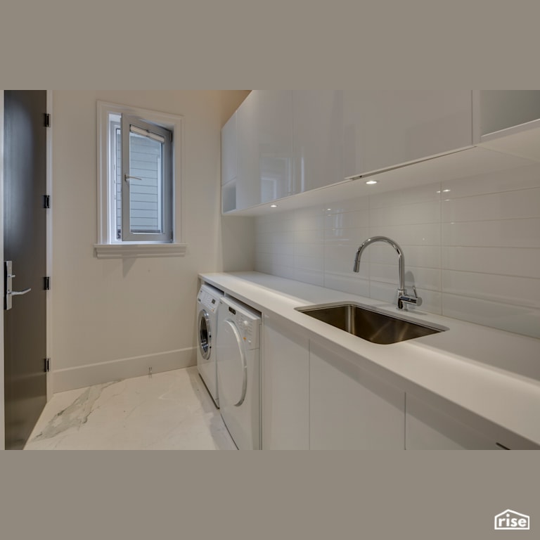 Executive Elegance - Laundry Room with Integrated LED by Clay Construction