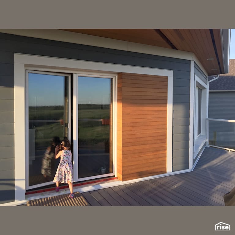 Exterior Deck with Fiber Cement Siding by MIZA Architects
