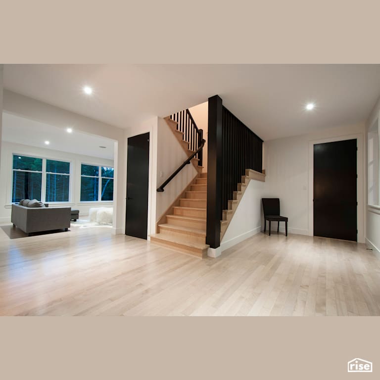 Modern Retreat - Staircase with Ceiling Light by Homes by Highgate