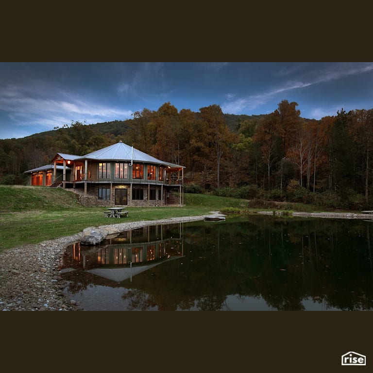 PA Roundhouse on the lake with Accent Outdoor Lighting by Deltec Homes