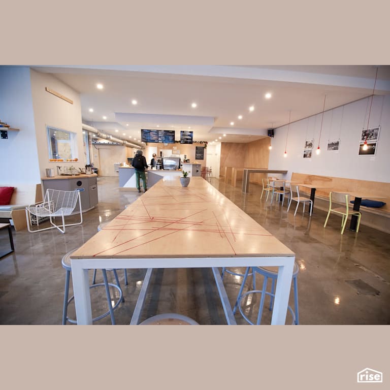 view of the cafe with Wood Veneer Cabinet by RSI Projects