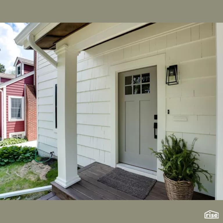 Front Porch - Exterior with Solid Wood Door by Constructive Builders