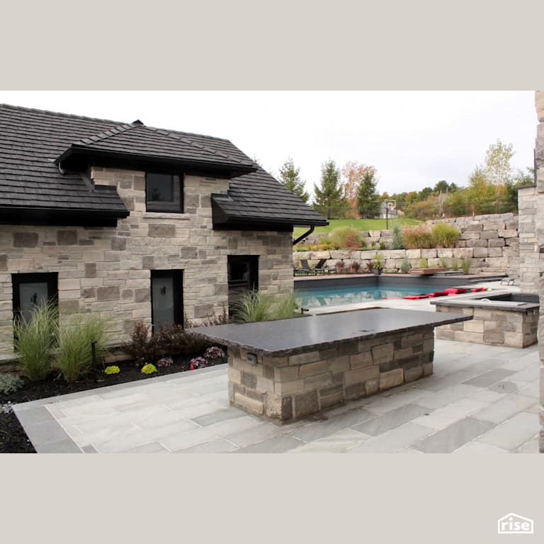 House with stone siding and pool with Stone Siding by Masonal Stone Inc