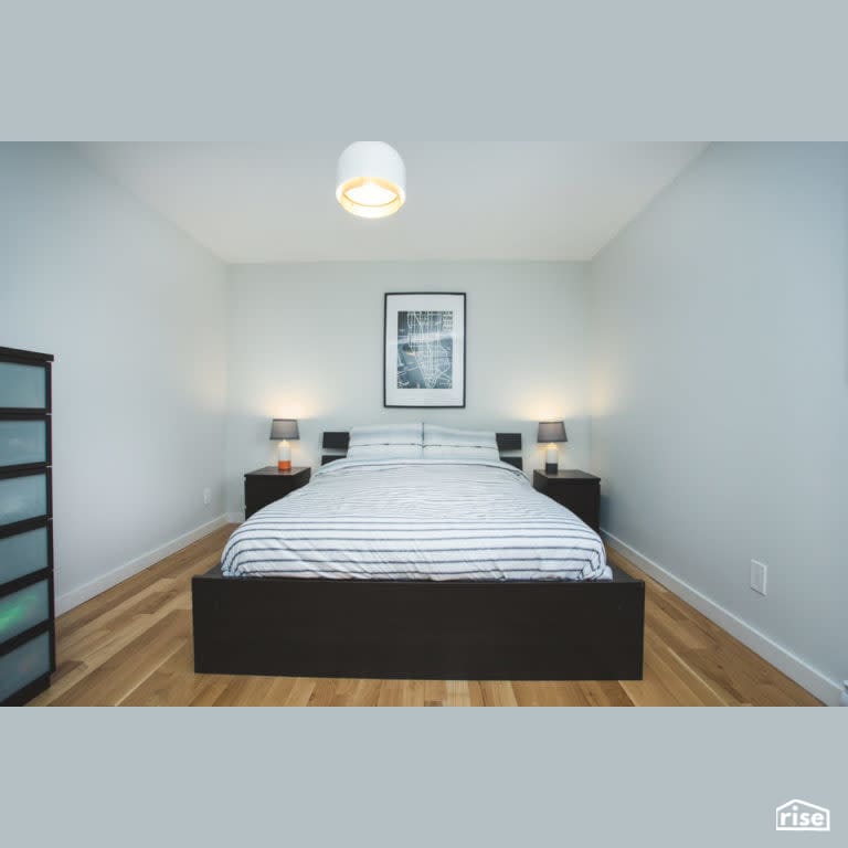 Joyfully Warm Rothesay Reno Bedroom with LED Lighting by Vantage Build