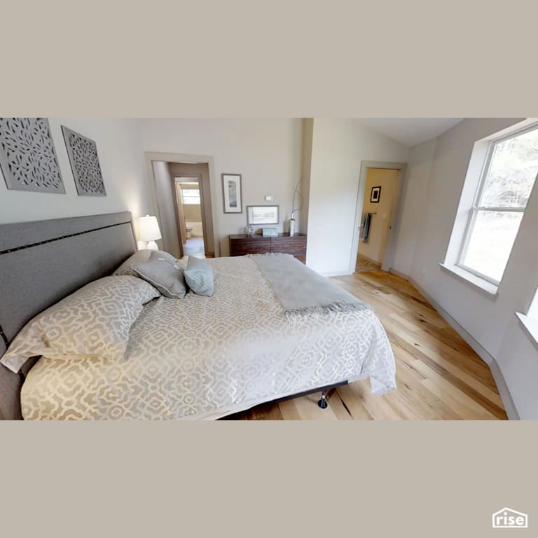 Roundhouse bedroom with Engineered Hardwood by Deltec Homes
