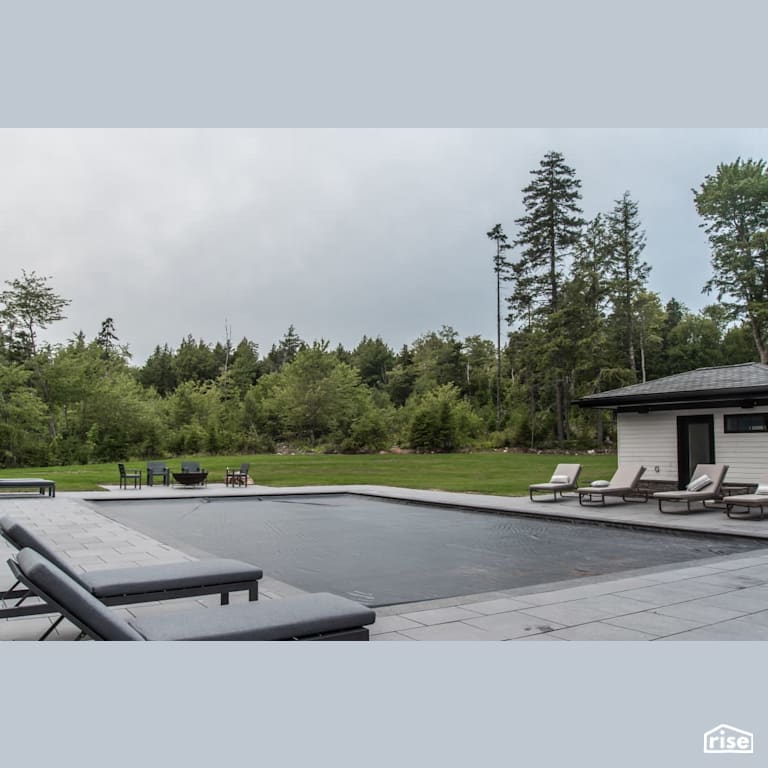 Heddas Way - Outdoor Pool with Patio Stone by Homes by Highgate