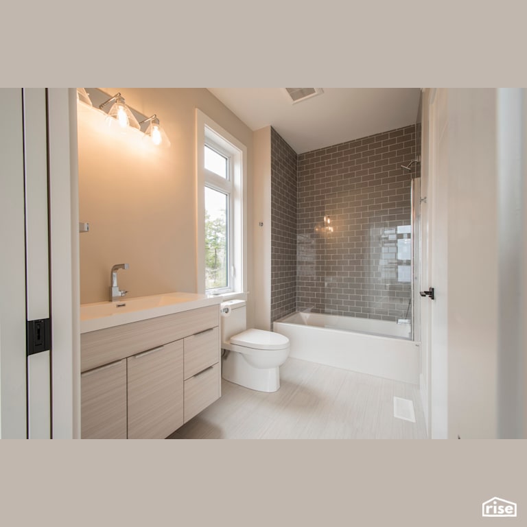 Bridge Over Water - Bathroom with Dual Flush Toilet by Homes by Highgate