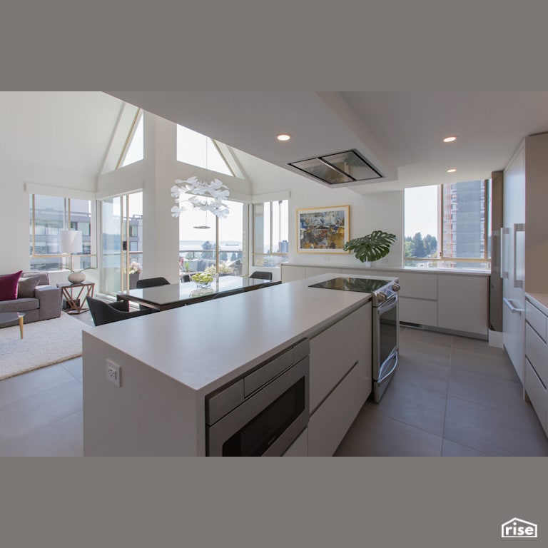 Penthouse Kitchen and Dining with Stone Countertop by Synthesis Design