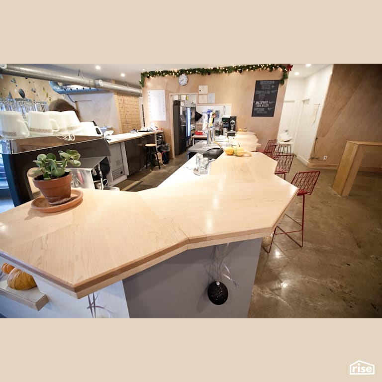 View of the non-square countertop with Concrete Flooring by RSI Projects