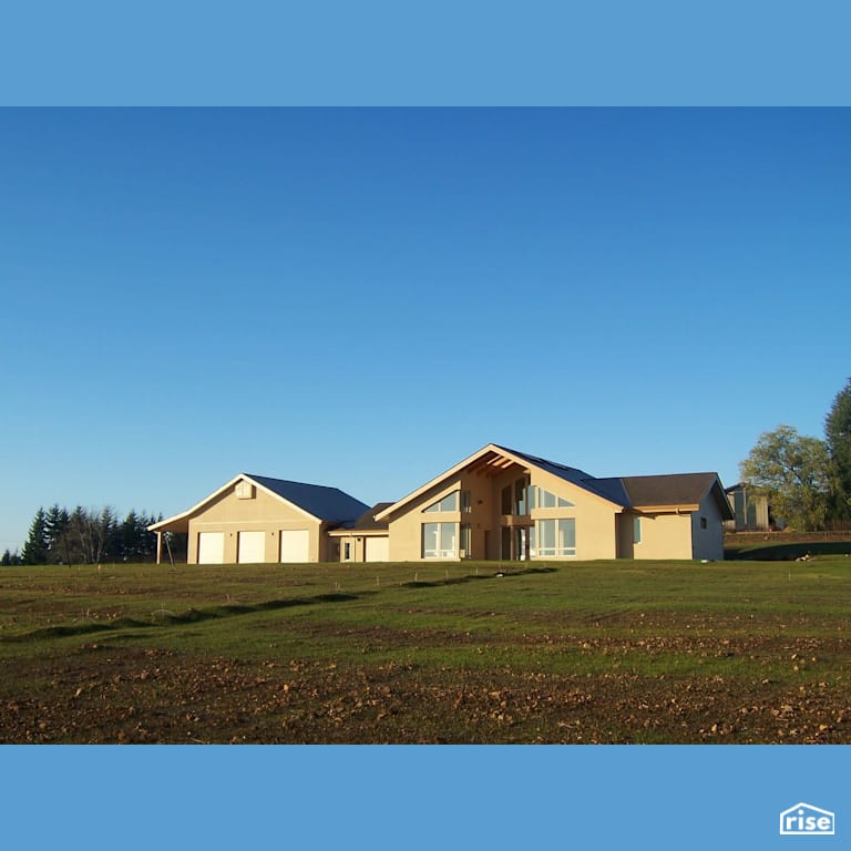 Home Exterior with Fixed Window by Winsome Construction