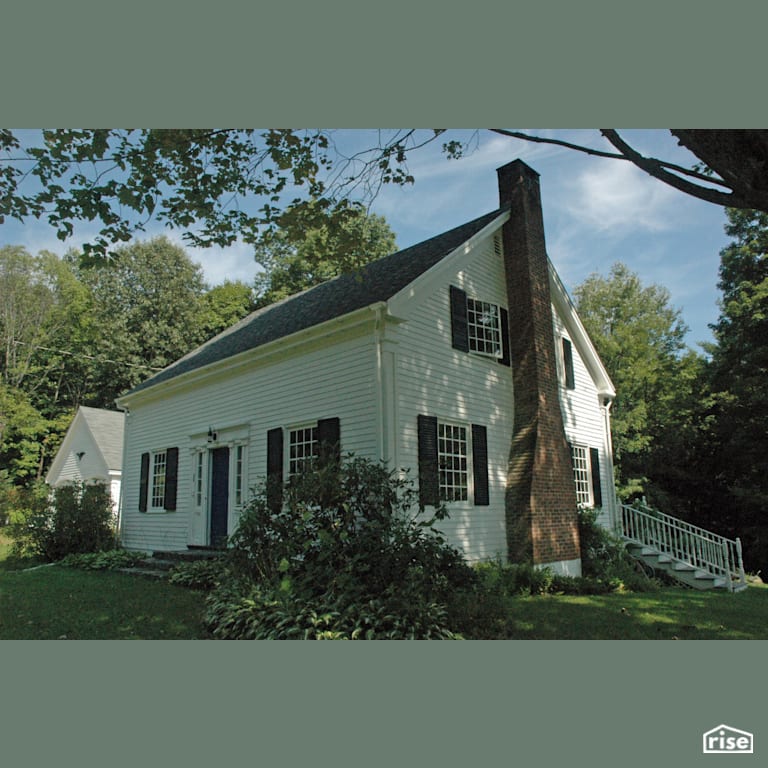 Front exterior view of energy efficient historic home with Casement Window by Alpen High Performance Products