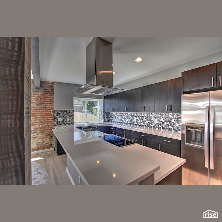 Open concept kitchen with exposed brick with Integrated LED by Alpen High Performance Products