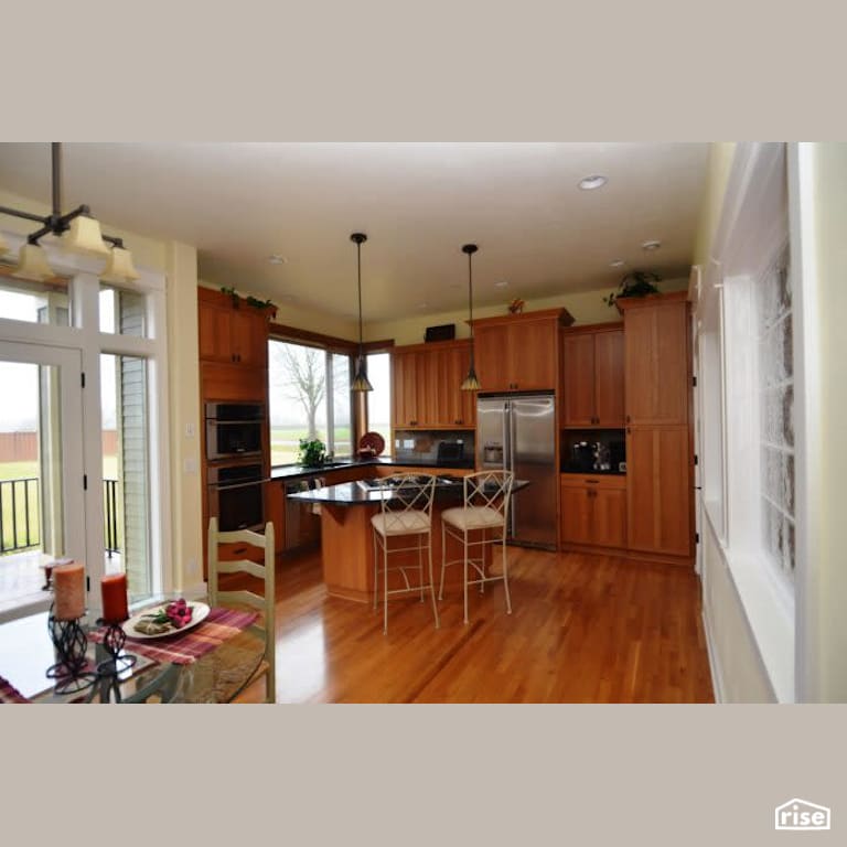 Kitchen with Wall Oven by Winsome Construction