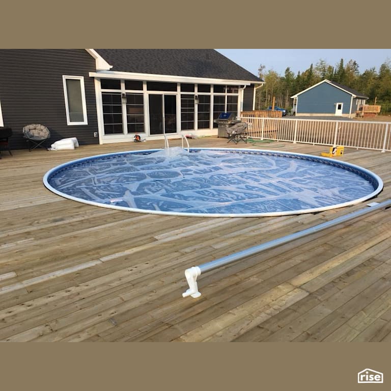 Outdoor Swimming Pool with Pressure Treated Decking by PoolBoy Inc