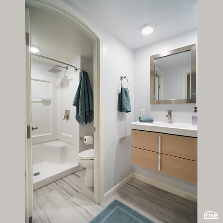 FlexHouse Bath and Shower with Laminate Flooring by Shelter Dynamics, Inc.