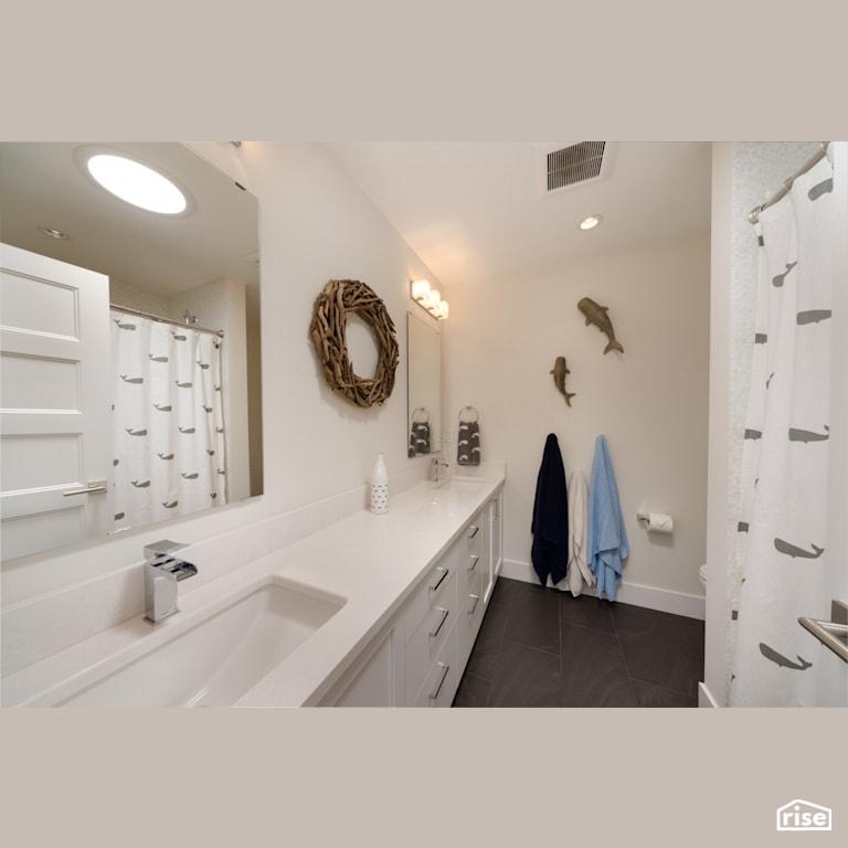 Bathroom with Low-Flow Bathroom Faucet by My House Design/Build Team Ltd.