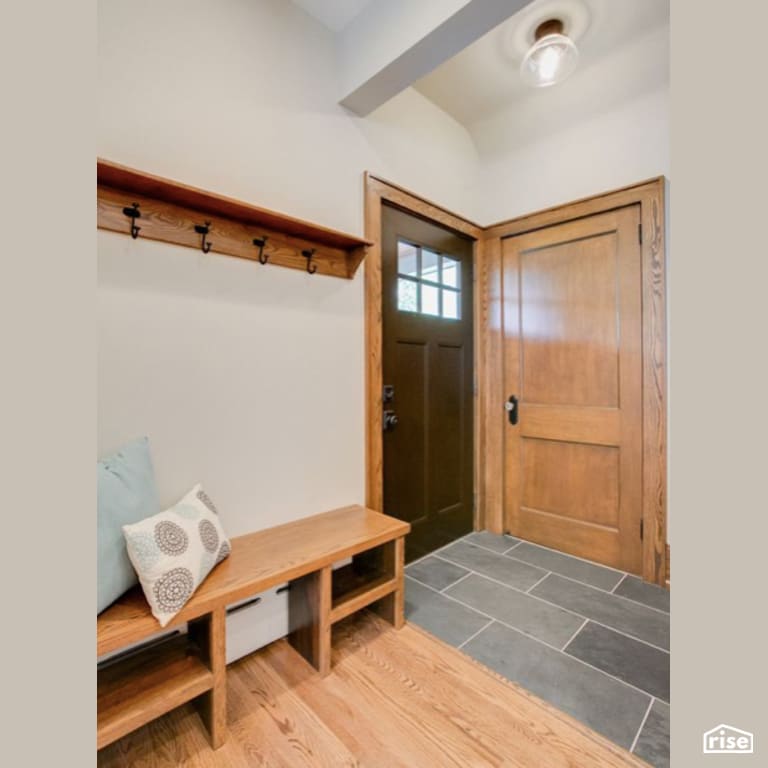 Entryway with Ceramic Tile Floors by Constructive Builders