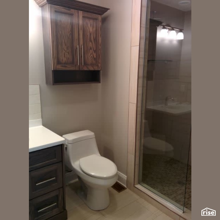 Bobak Place - Bathroom with Ceramic Tile Floors by Hill Bros.
