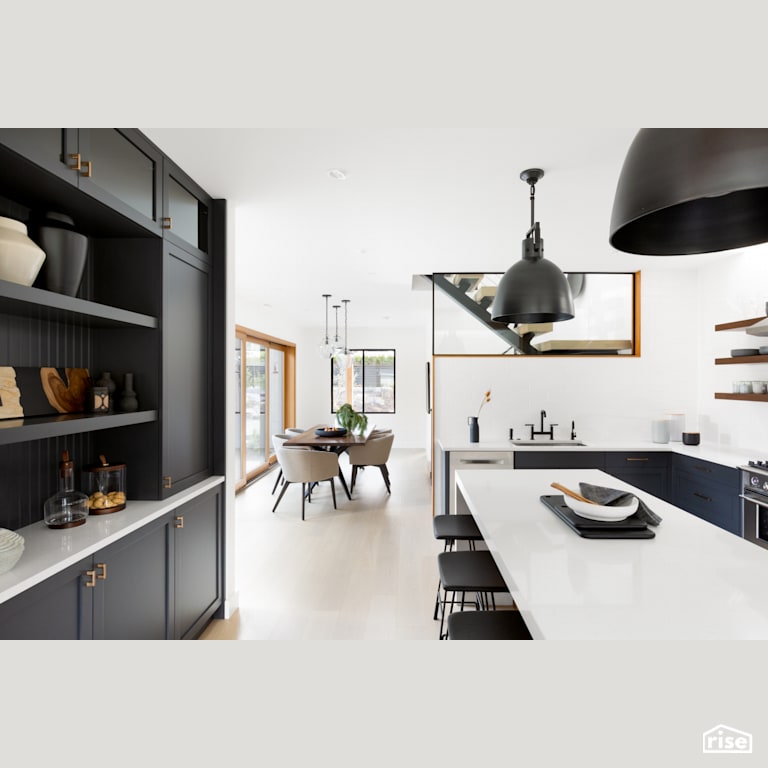 Open Concept Kitchen with Plenty of Storage with Gas Range by Synthesis Design