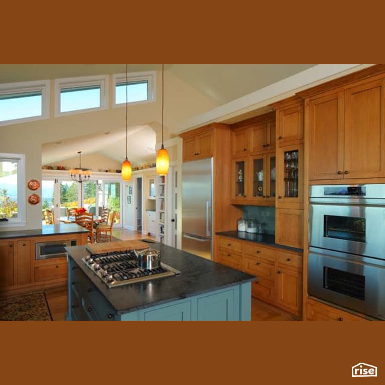 Kitchen with Wall Oven by Winsome Construction
