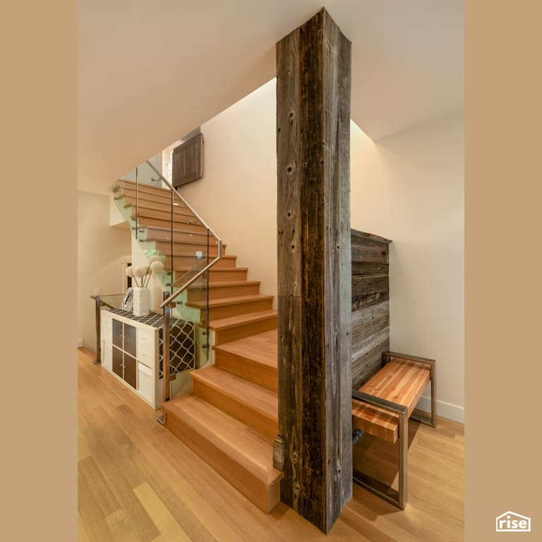 Staircase with Reclaimed Hardwood by My House Design/Build Team Ltd.