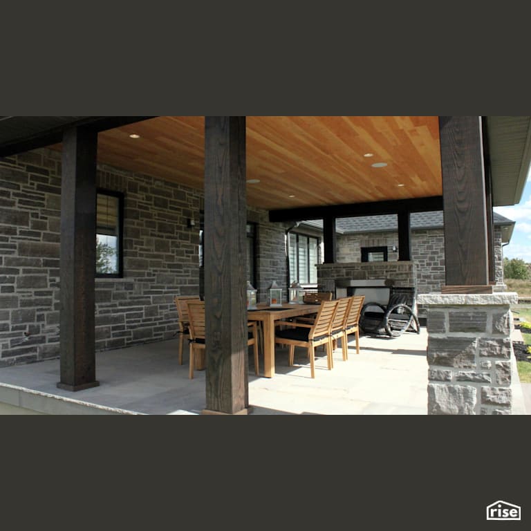 Patio with feature ceiling with Stone Siding by Masonal Stone Inc
