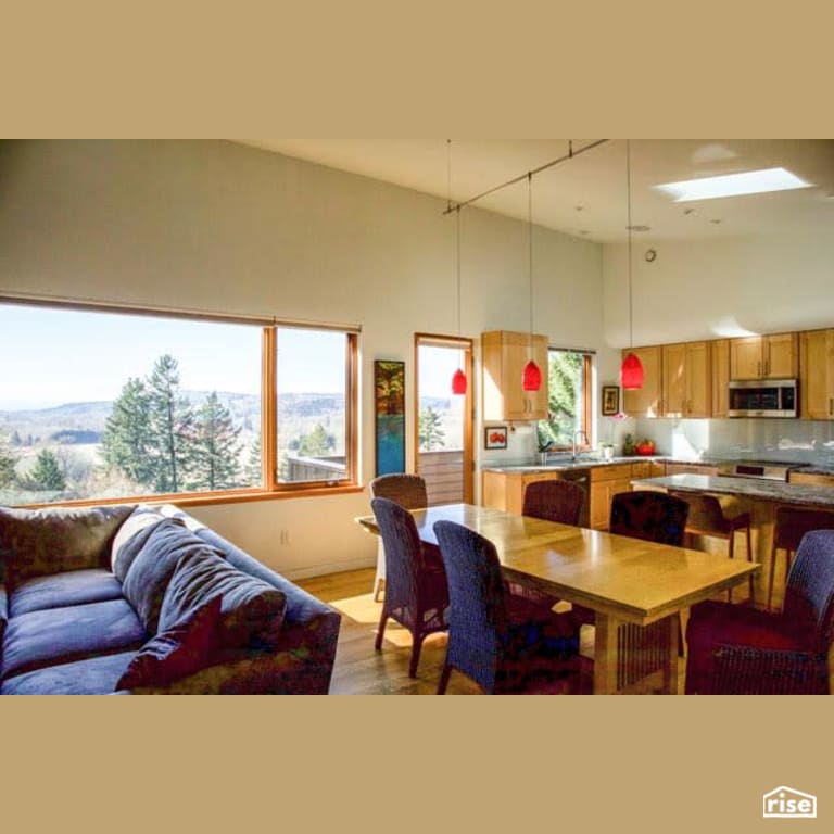 Dining Room and Kitchen with Induction Cooktop by Winsome Construction