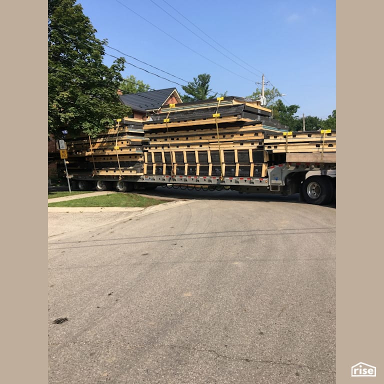 Panels Loaded onto Flatbed Truck with Prefabricated Panelized Home by Simple Life Homes