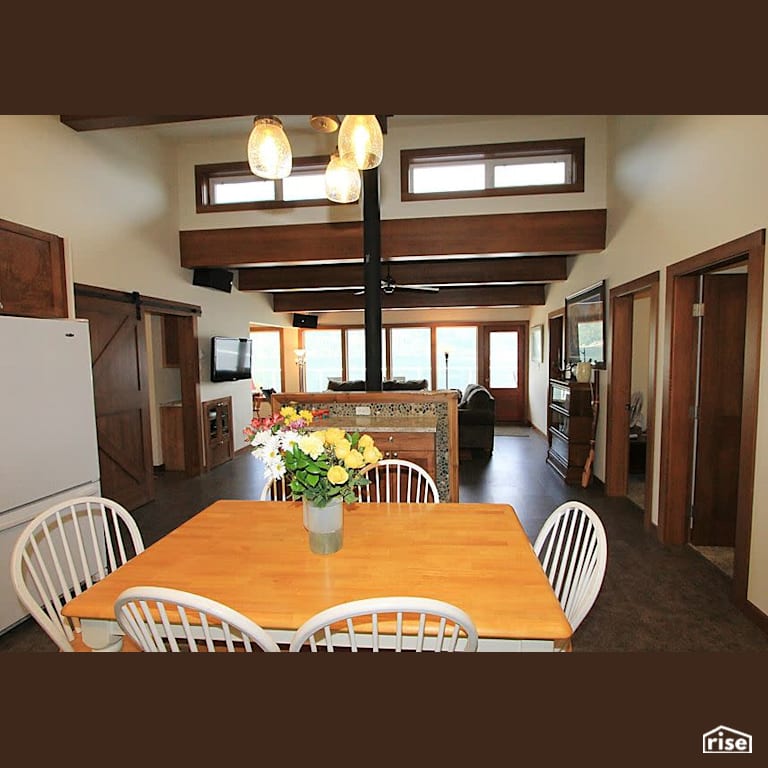 Copper Island Fine Homes - Dining Room with Energy Star Exterior Door by Copper Island Fine Homes Inc.