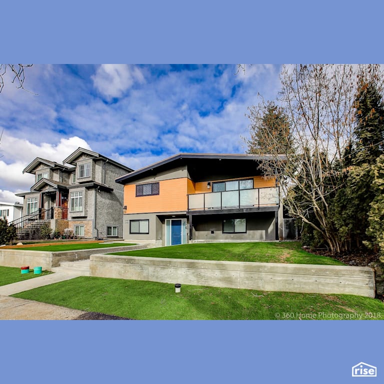 Main House Renovation  with Asphalt Shingles by KPC Homes Ltd. 