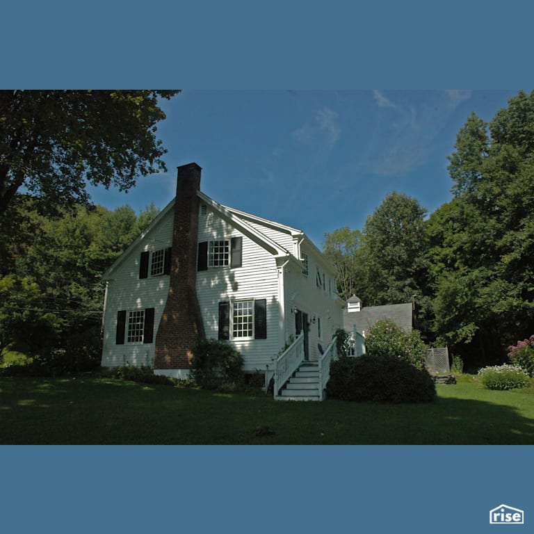 Rear exterior view of energy efficient historic home with Triple Pane Window by Alpen High Performance Products