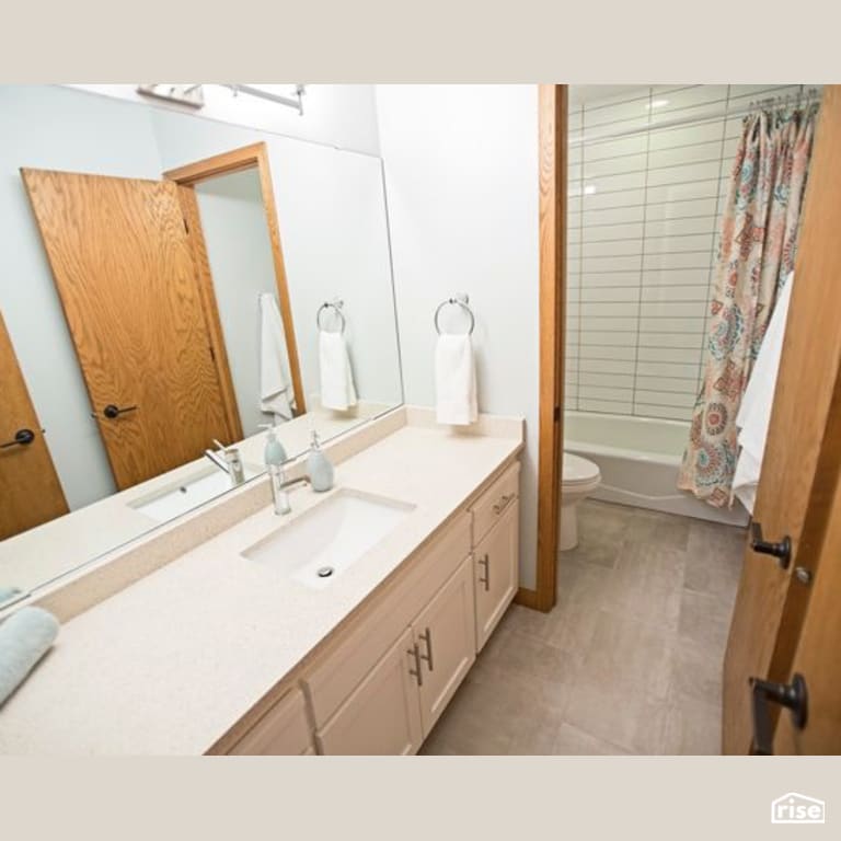 Bathroom with Dual Flush Toilet by Constructive Builders