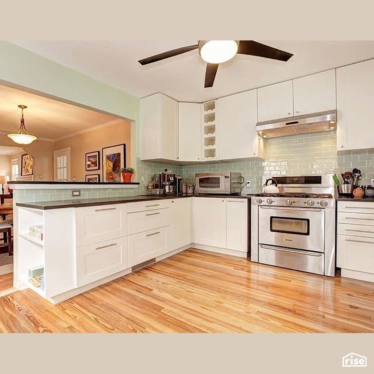 Open kitchen with finished hardwood floors with Interior Wood Finish by Vermont Natural Coatings