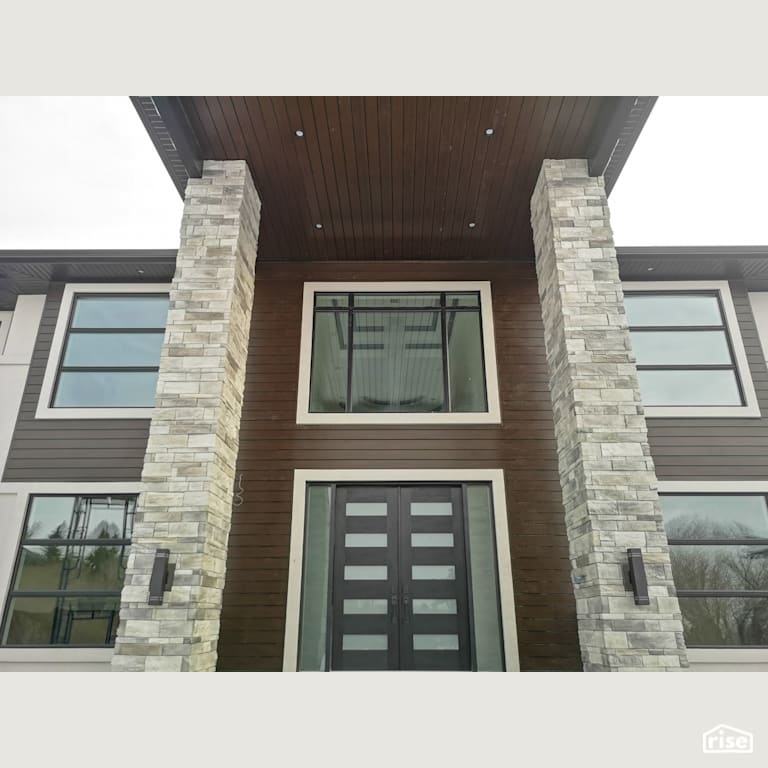 Brown composite siding and soffits with Composite or Engineered Siding by ChamClad by Chameleon