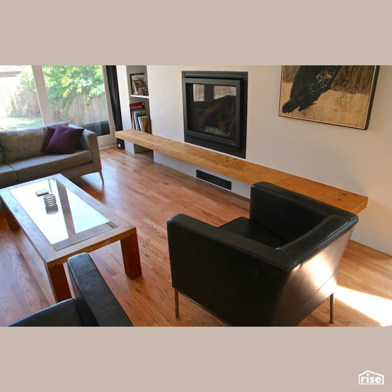 Family room fireplace with Engineered Hardwood by Revolve Design Build