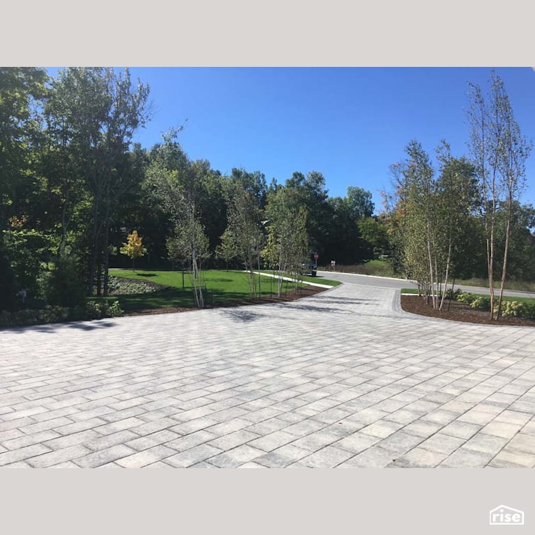 Driveway Landscaping with Paver Stones with Wood Mulch by Earthworks Landscape & Design