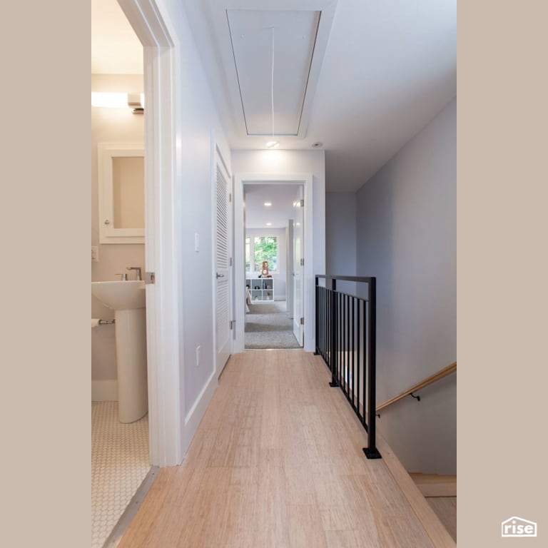 Hallway with Bedroom and Bath with Laminate Flooring by Module