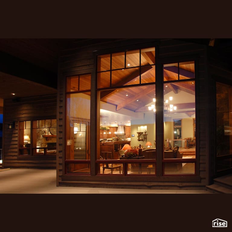 Large exterior windows allows abundant natural light into the open living area with Fixed Window by Alpen High Performance Products