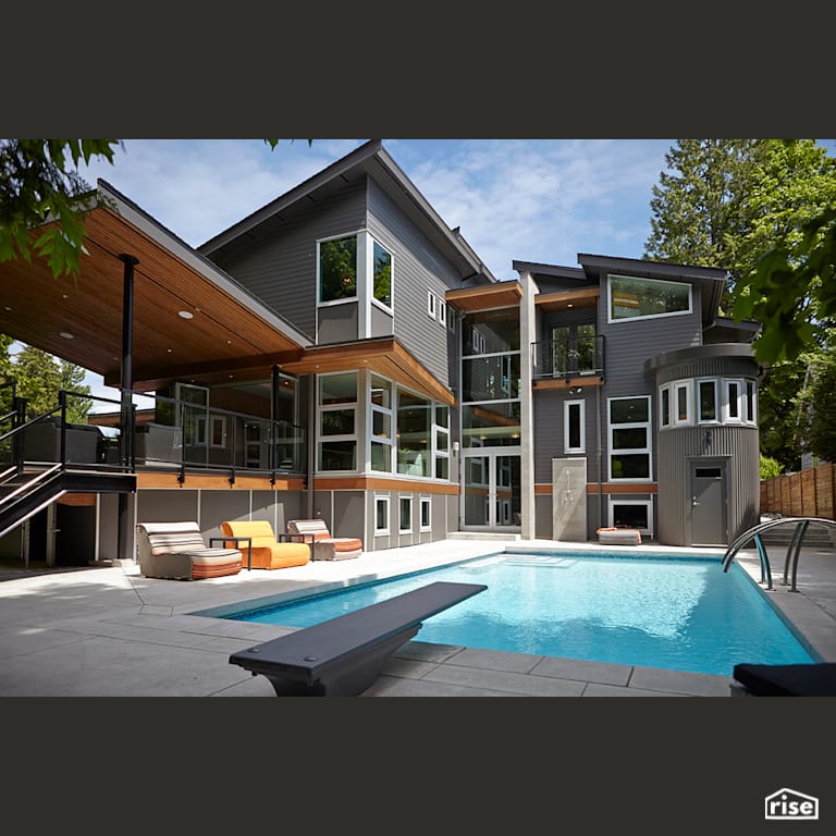 Pool with Accent Outdoor Lighting by My House Design/Build Team Ltd.